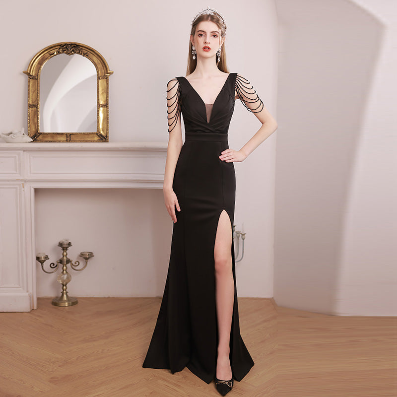 Black sexy V-neck evening dress female 2023 new high-end banquet temperament socialite high set host fishtail dress